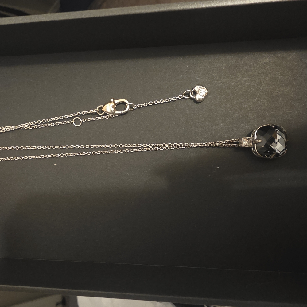 Elegant Silver Necklace with Black Pendant